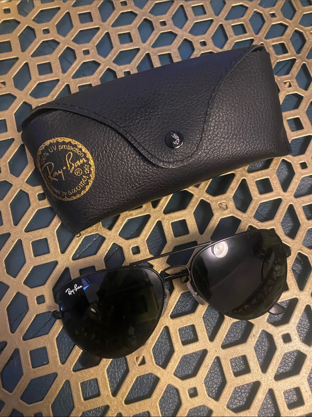 Ray-Ban Black Frame Sunglasses with Dark Lenses